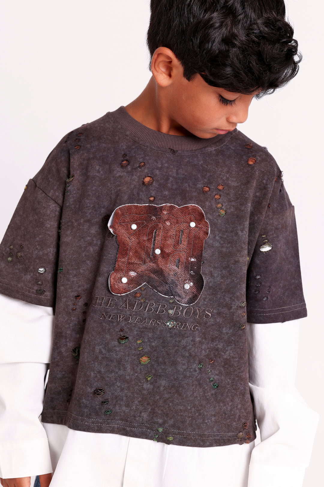 DISTRESSED SWEATSHIRT WITH LAYERED HEM