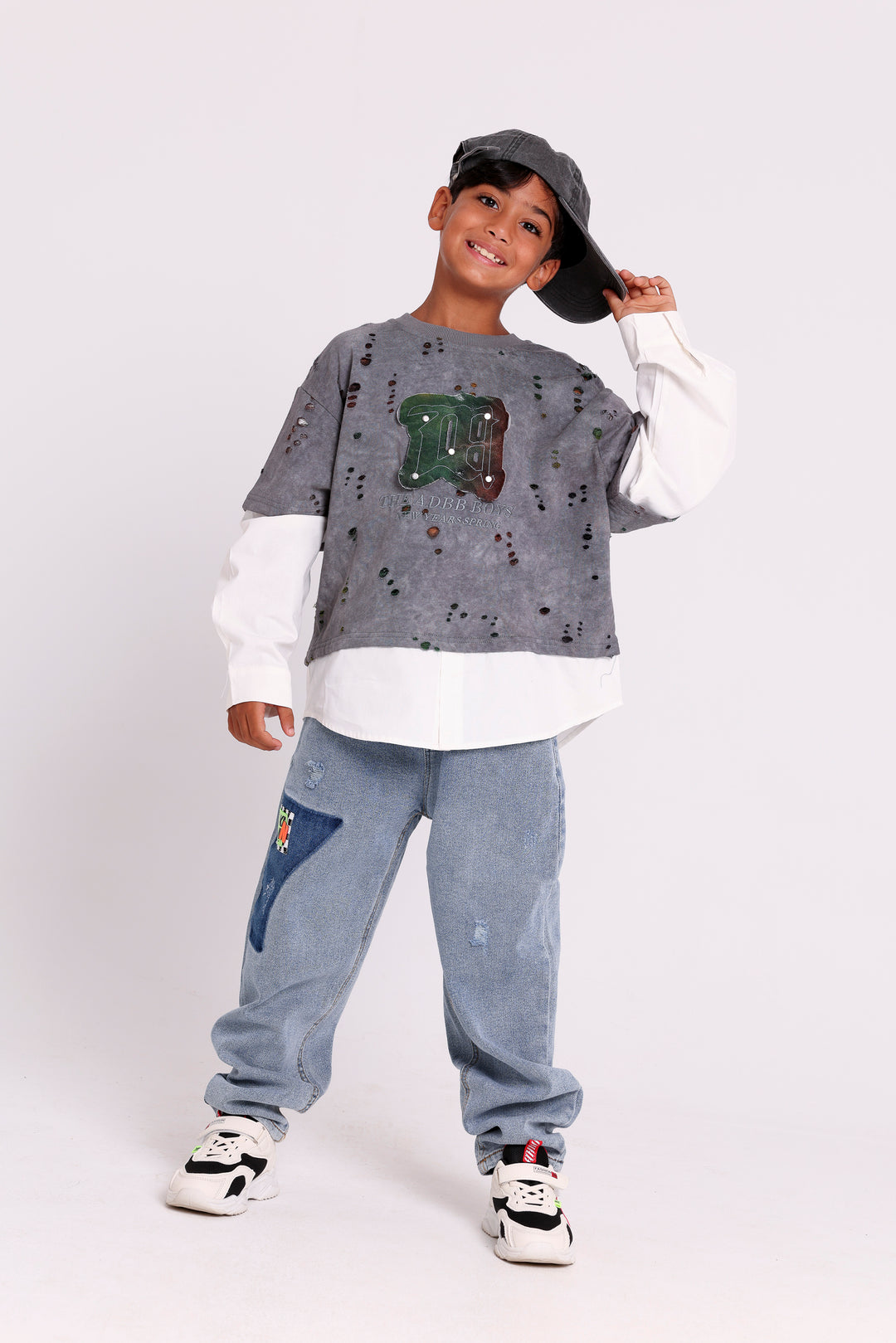 DISTRESSED SWEATSHIRT WITH LAYERED HEM