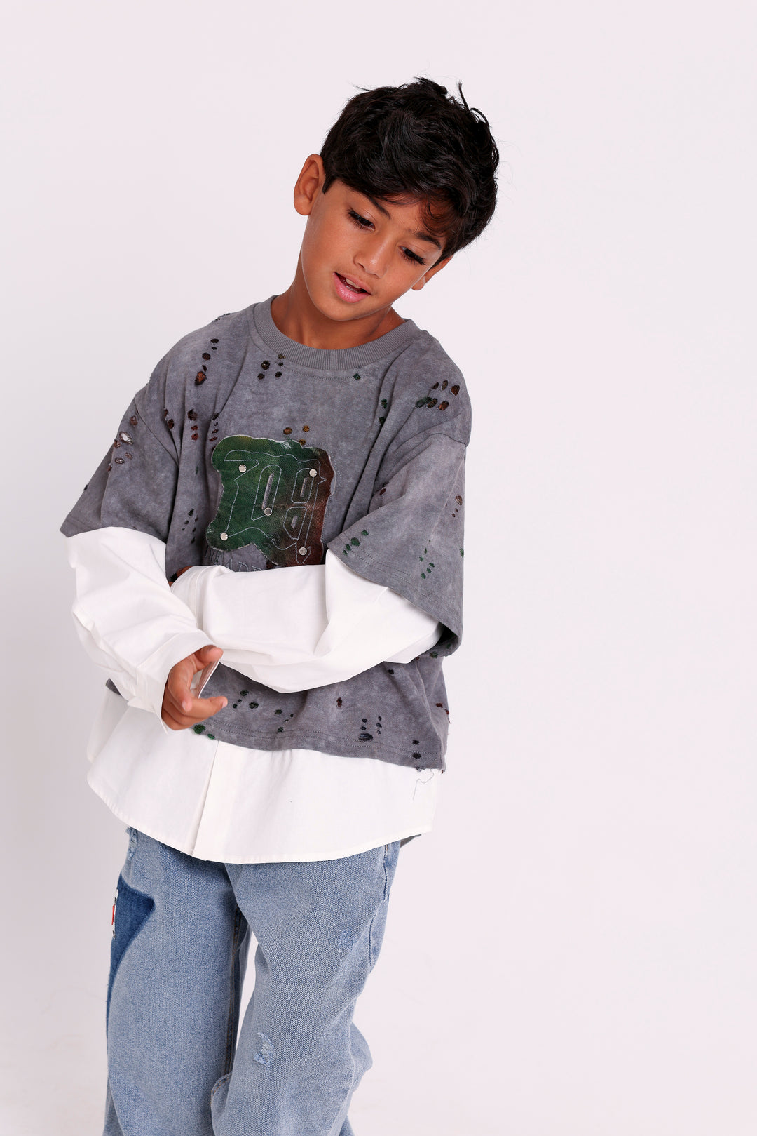 DISTRESSED SWEATSHIRT WITH LAYERED HEM
