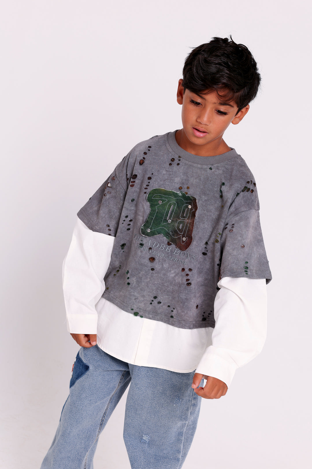 DISTRESSED SWEATSHIRT WITH LAYERED HEM
