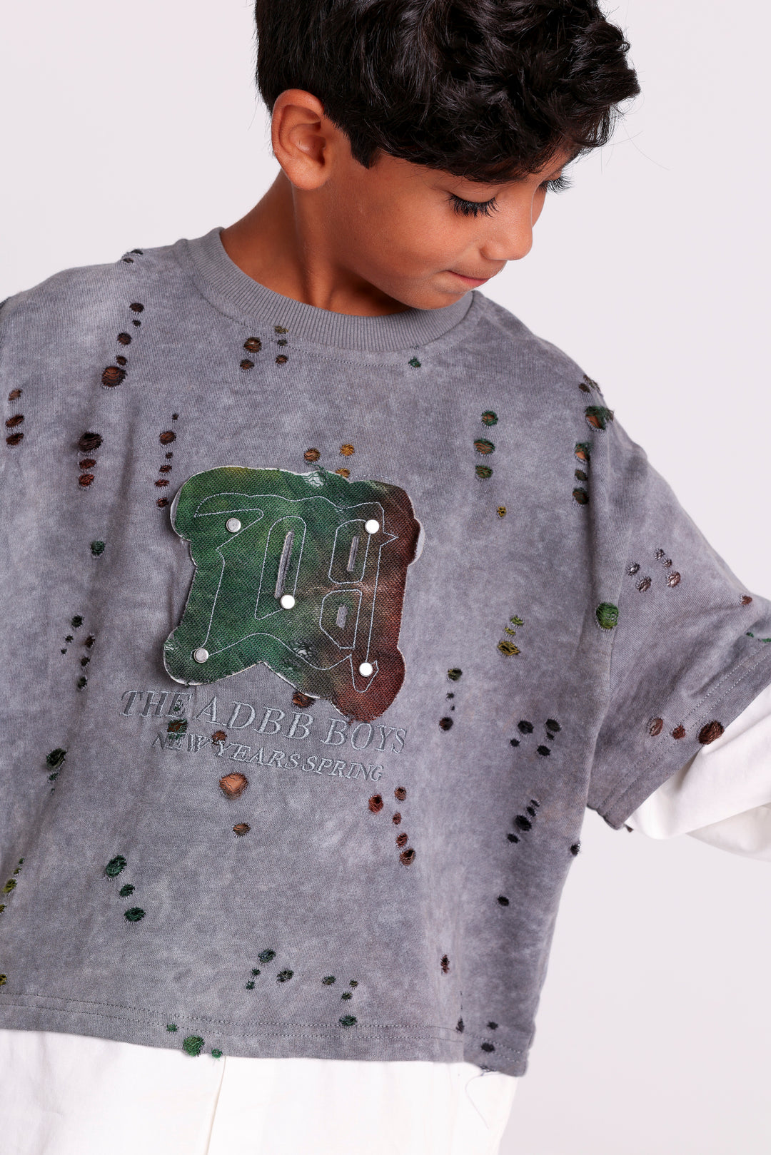 DISTRESSED SWEATSHIRT WITH LAYERED HEM