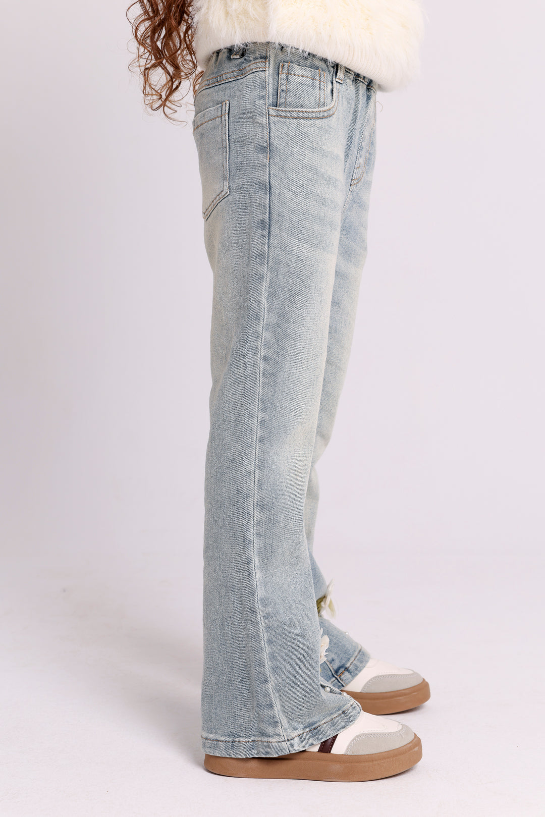 FLARED DENIM PANTS WITH HEM FLOWERS