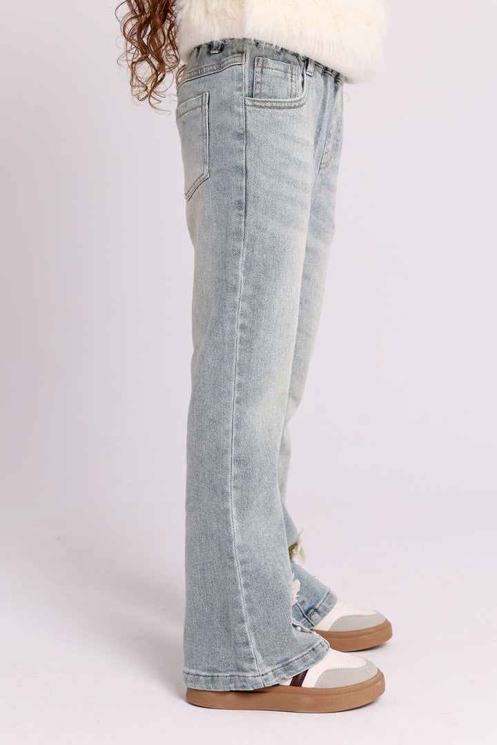 FLARED DENIM PANTS WITH HEM FLOWERS