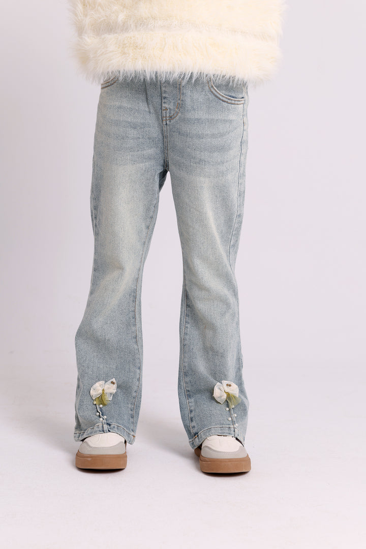 FLARED DENIM PANTS WITH HEM FLOWERS