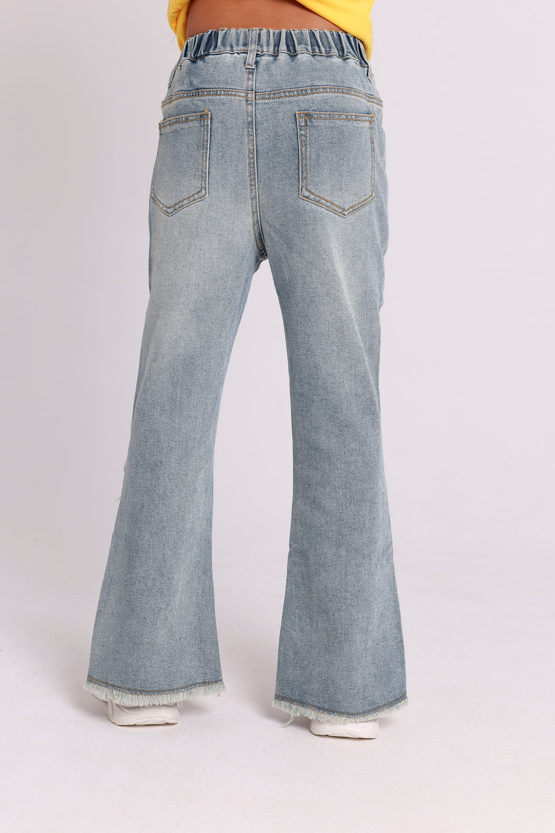FLARED DENIM PANTS WITH SIDE SLITS