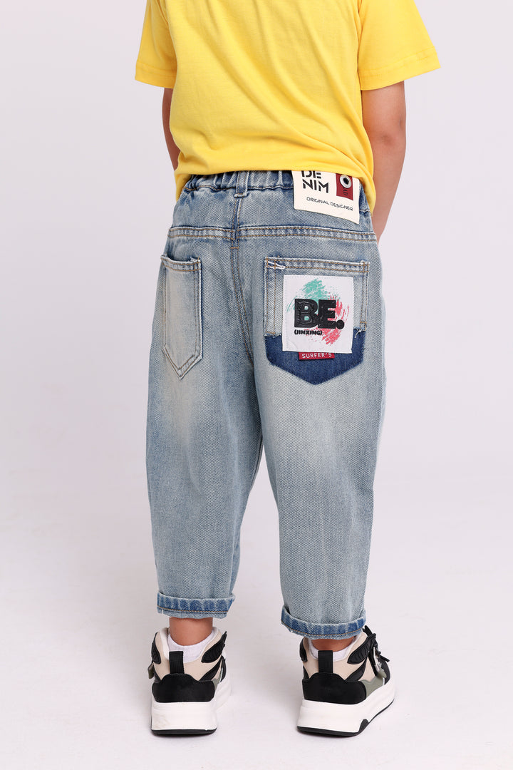 RELAXED DENIM PANTS WITH CHAIN DETAIL