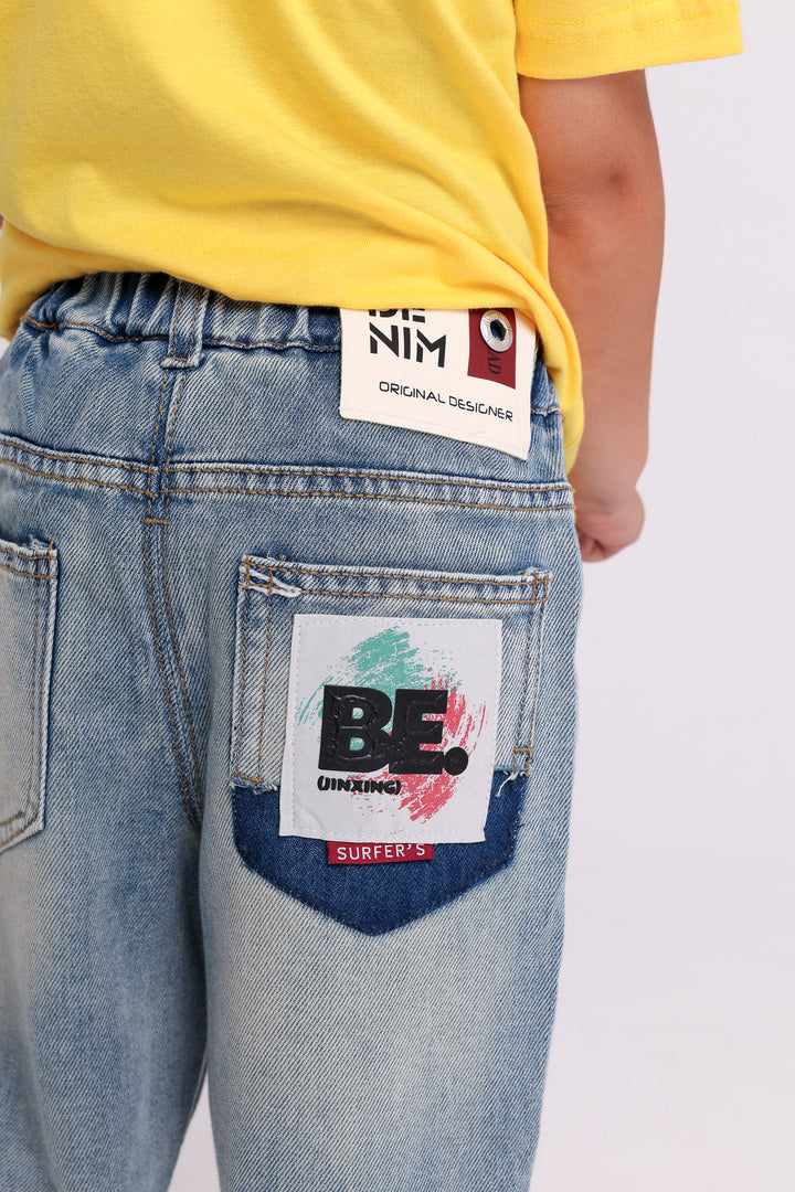 RELAXED DENIM PANTS WITH CHAIN DETAIL